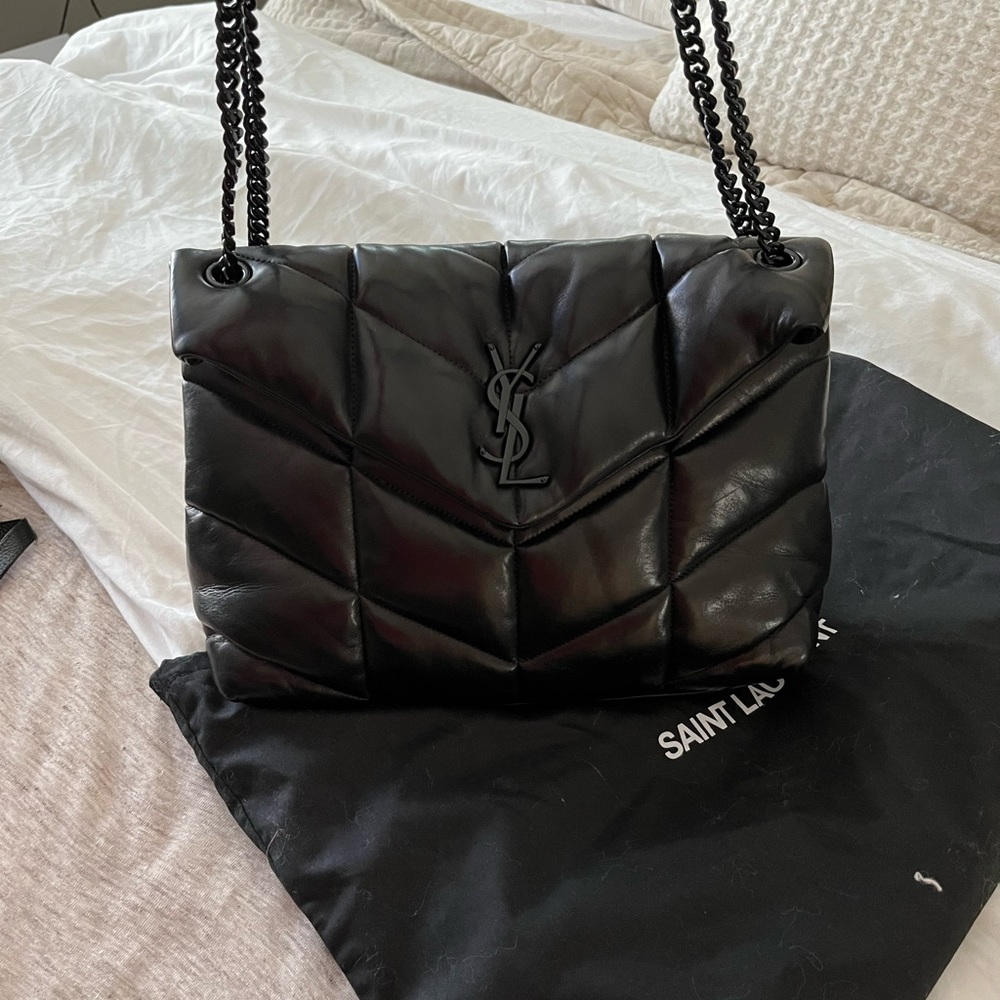 Yls loulou size medium, purchased from saks for 2300. In excellent condition.